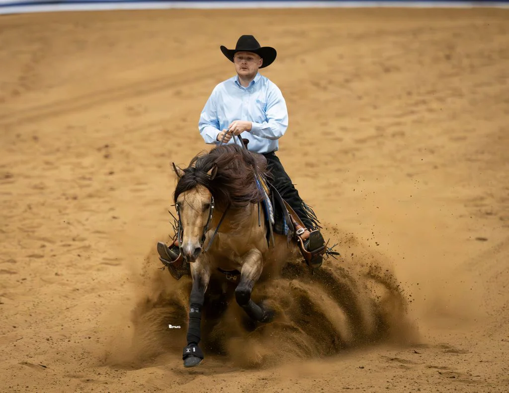 kisha itkin riding outta yur league in an interior stable
